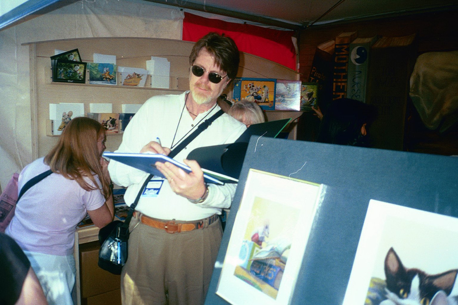 FOB-Len signing a book.JPG